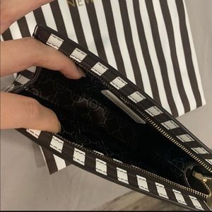 Beautiful leather centennial stripes Henri Bendel makeup/clutch bag